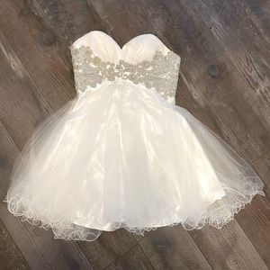 Sweetheart neckline white bejewelled strapless mini dress